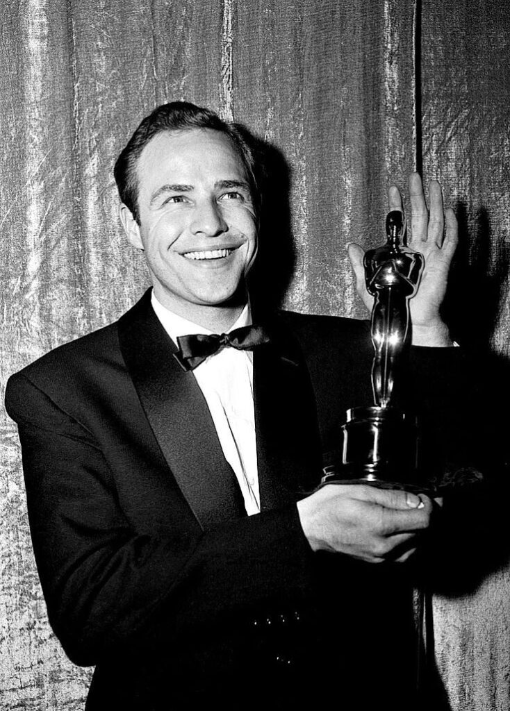 Marlon Brando with his Oscar for On the Waterfront, 1955