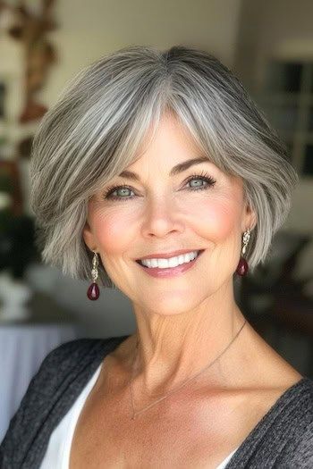 woman over 60 with a short gray bob with soft layers