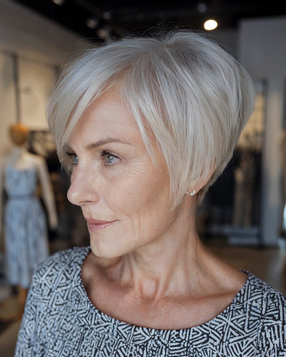 woman over 60 with an angled short bob haircut