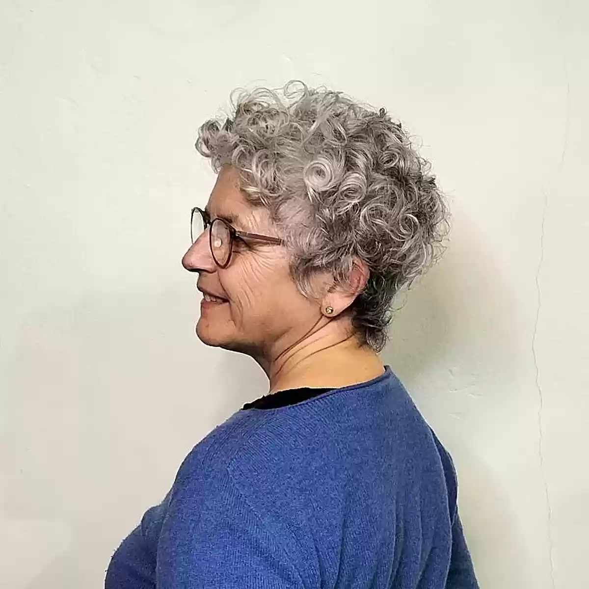 elderly woman with short curly crop hairstyle