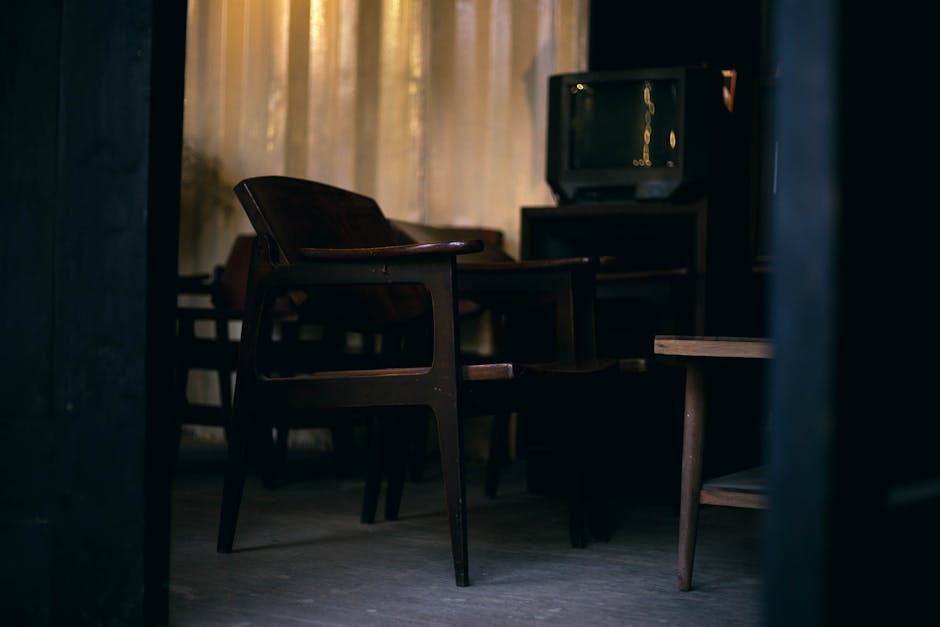 A 1950s living room with a Zenith black-and-white TV as the centerpiece, showing a family adjusting rabbit ear antennas