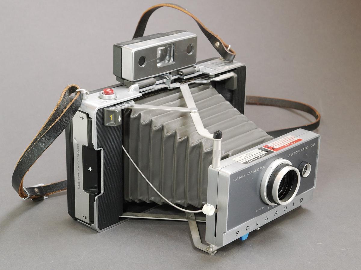 A collection of vintage Polaroid Land cameras from various eras